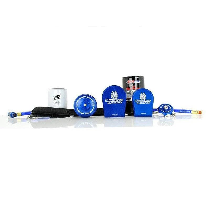 Sinister Diesel 6.0L Powerstroke oil and coolant filtration system with blue anodized billet blocks and braided lines.