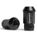 Set of 20 Skunk2 Black Series 12x1.5 forged 7075 aluminum lug nuts with knurled ends and black anodized finish.