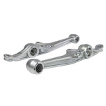 A pair of Skunk2 yellow zinc plated front lower control arms with TIG welded spherical bearing cups and steel bushings.