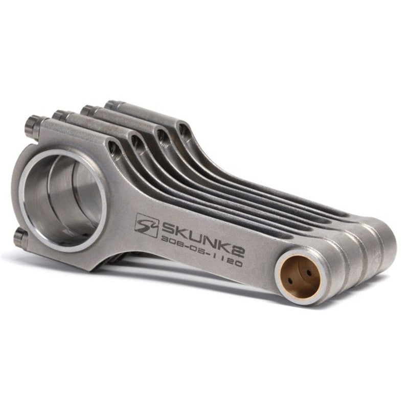 Set of Skunk2 Alpha Series H-beam connecting rods for B18C engines with ARP2000 bolts and bronze bushings.