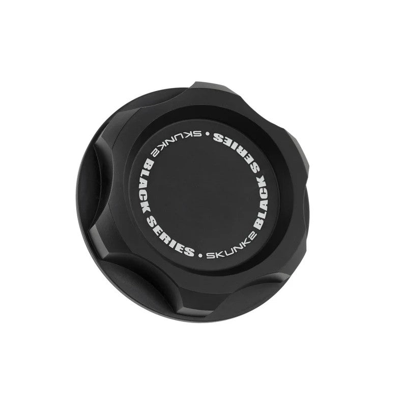 Black anodized Skunk2 Black Series billet aluminum oil cap featuring acid-etched logo and M33 x 2.8 threading.