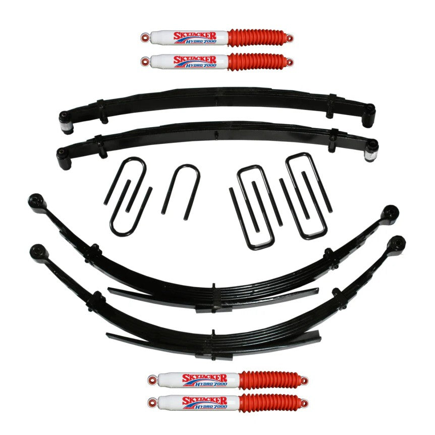 Skyjacker 4-inch suspension lift system for Dodge W250 W350 with four Hydro 8000 series shocks and mounting hardware.