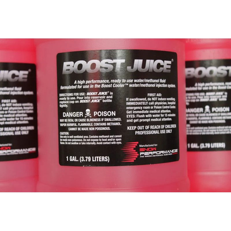 Four one-gallon jugs of Snow Performance Boost Juice water-methanol injection fluid in a case.