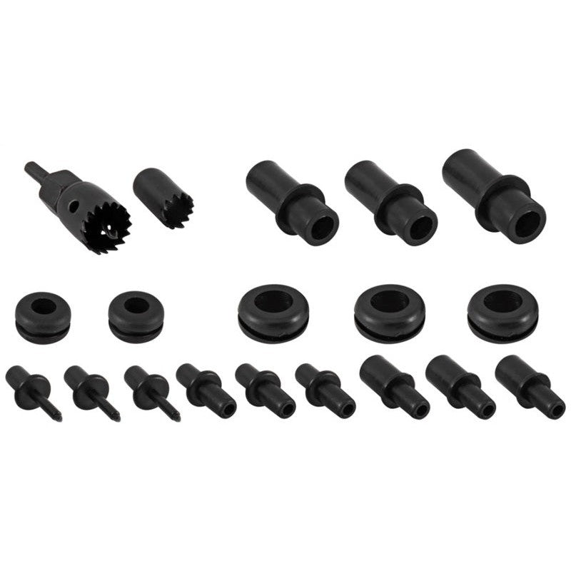 Spectre 8711 vacuum and sensor intake adapter kit featuring 12 multi-size fittings, black grommets, and two hole saws.