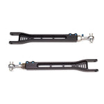 Black anodized SPL Parts billet aluminum rear toe links with blue titanium hardware for Nissan GT-R R35.