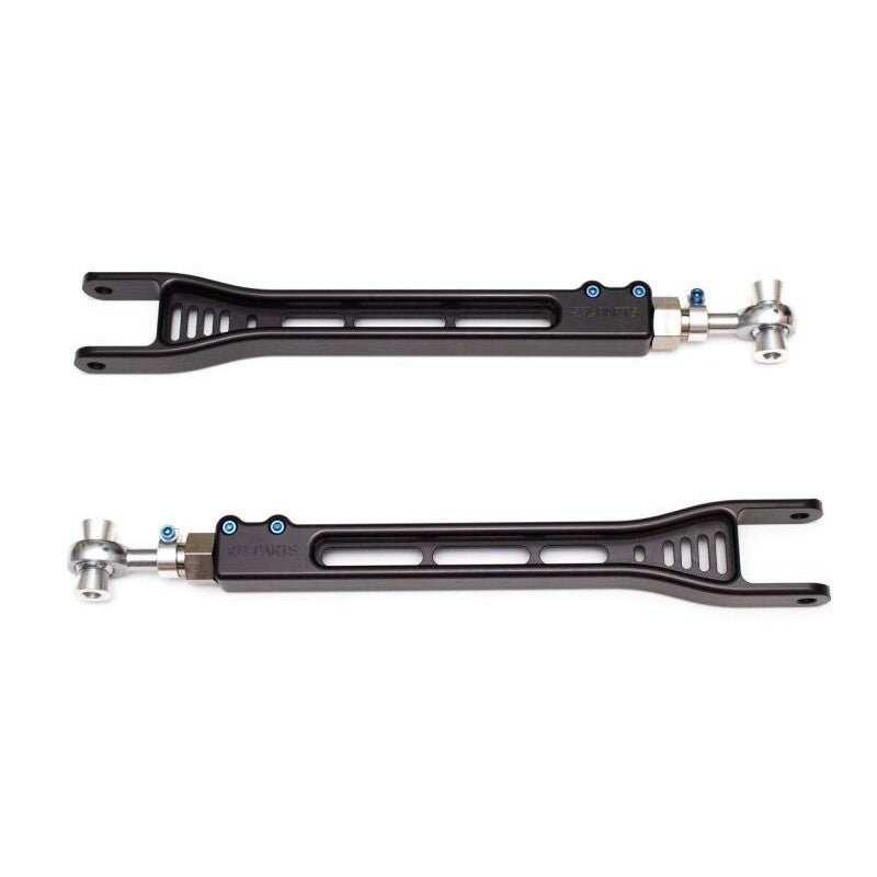 Black anodized SPL Parts billet aluminum rear toe links with blue titanium hardware for Nissan GT-R R35.