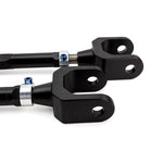 SPL Parts rear traction links featuring gun-drilled 2024 aluminum and blue titanium hardware for BMW F3X chassis.
