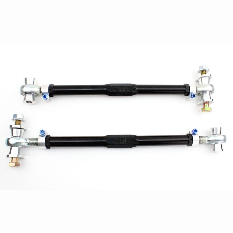 Black anodized gun-drilled aluminum SPL Rear Toe Links with rod ends and eccentric lockout hardware for BMW M2, M3, and M4.