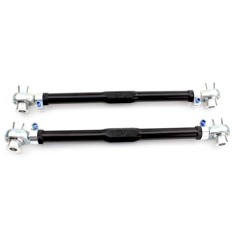 Pair of black anodized SPL Parts rear traction links with blue titanium hardware for BMW M2, M3, and M4.
