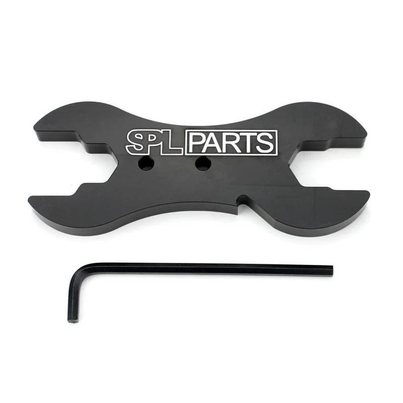 Black anodized CNC machined billet aluminum adjustment wrench with integrated 3/16 inch Allen key storage.