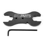 Black anodized CNC machined billet aluminum adjustment wrench with integrated 3/16 inch Allen key storage.