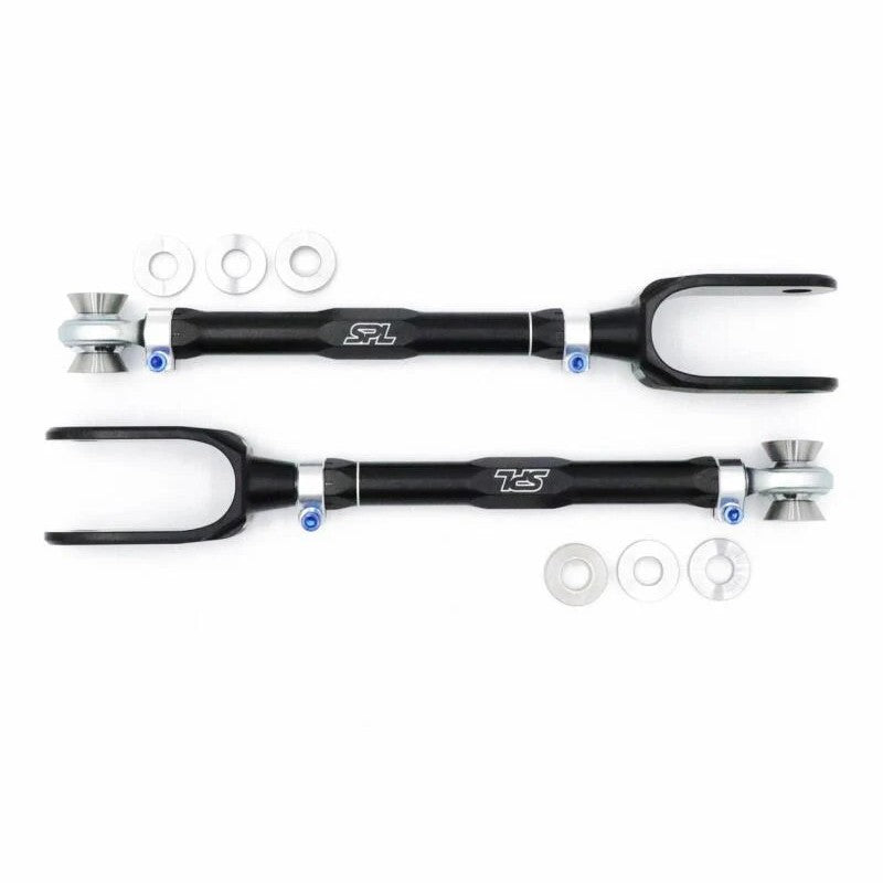 Blue and silver SPL Parts adjustable caster trailing arms with titanium hardware for Porsche 911, Boxster, and Cayman.