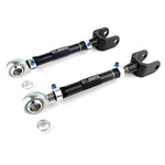 SPL Parts dogbone style rear traction rods with gun-drilled 2024 aluminum links and blue titanium hardware.