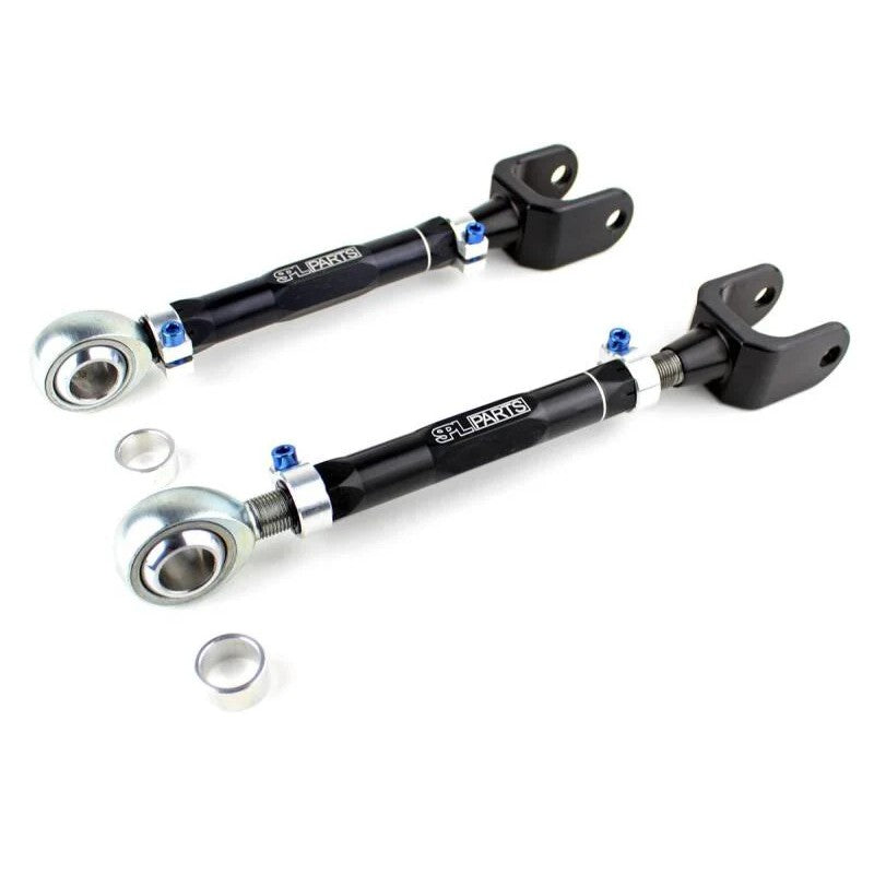 SPL Parts dogbone style rear traction rods with gun-drilled 2024 aluminum links and blue titanium hardware.