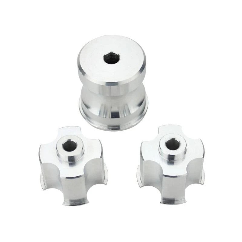 Set of CNC-machined 6061-T6 billet aluminum solid differential mount bushings for BMW G-series and Toyota Supra.
