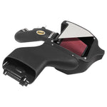 Airaid MXP cold air intake system with black roto-molded air box, black HDPE intake tube, and red oiled air filter.