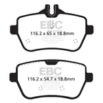 EBC Redstuff ceramic rear brake pads with red finish and abrasive Brake-In surface coating.