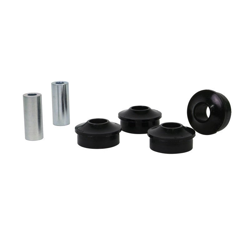 Whiteline Plus front radius rod bushing kit with black synthetic elastomer bushings and metal sleeves.