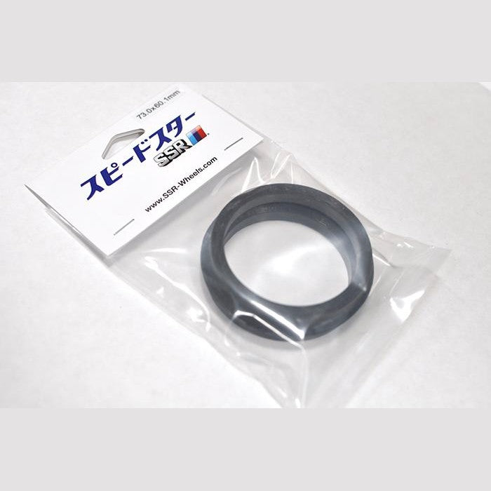 Pair of black SSR plastic hubcentric rings showing 73.0mm outer diameter and 56.1mm inner diameter dimensions.
