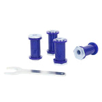 SuperPro SPF4185K polyurethane rear trailing arm bushings with offset steel sleeves for alignment adjustment.
