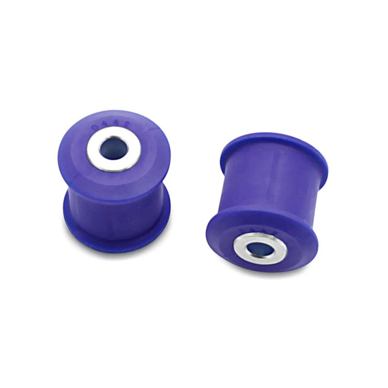 SuperPro SPF2461K polyurethane rear lower trailing arm bushing kit with metal sleeves and assembly grease.