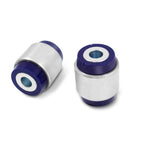Blue polyurethane SuperPro front lower control arm shock mount bushings with metal sleeves for SPF3076K kit