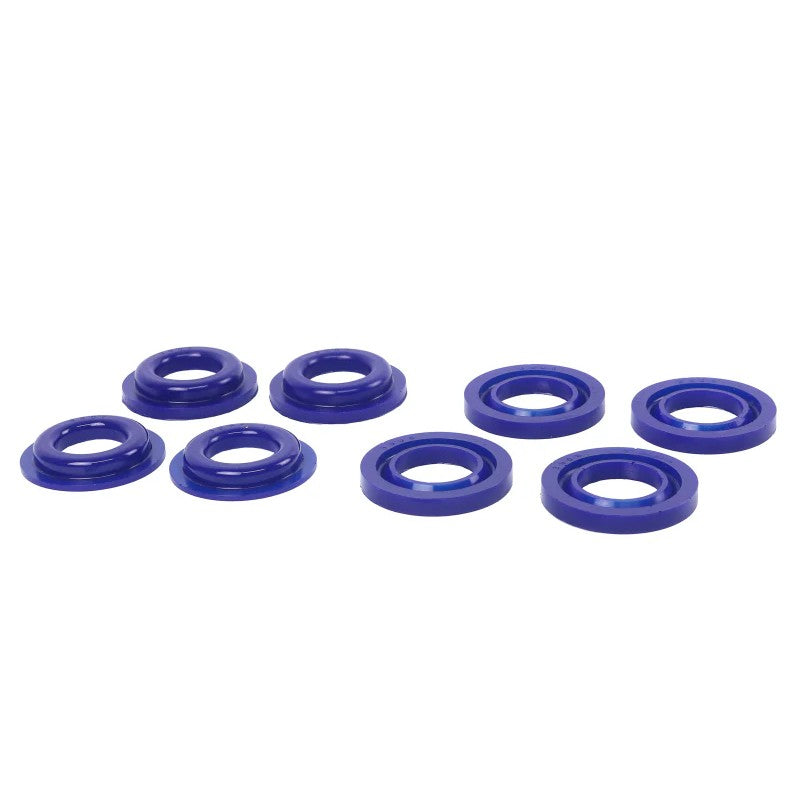 SuperPro polyurethane rear subframe insert bushings in signature blue finish for Subaru and Toyota suspension systems.