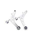 SuperPro ALOY0017K front lower alloy control arms with blue bushings and DuroBall caster offset assemblies.