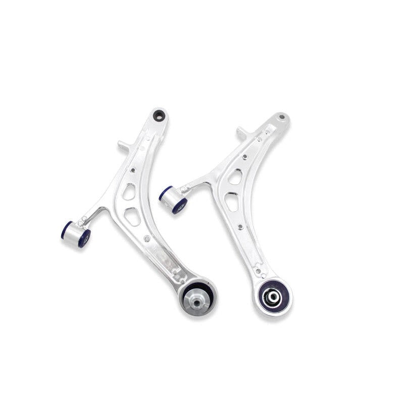 SuperPro ALOY0017K front lower alloy control arms with blue bushings and DuroBall caster offset assemblies.
