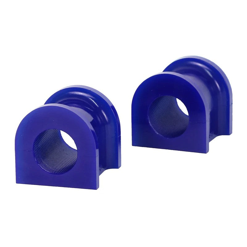 Two SuperPro sway bar mount bushings with internal grease retention grooves and mounting surfaces.