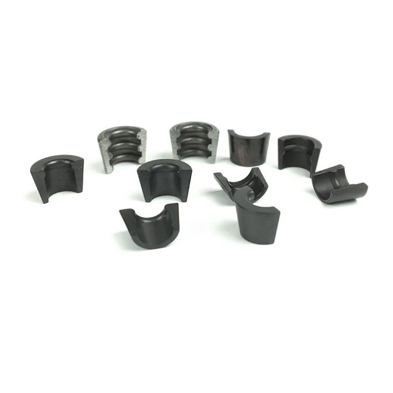 Set of 24 Supertech triple groove valve locks for BMW M50 engines, part number KPR-VW6-T-24.