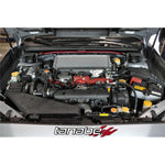 Tanabe Sustec aluminum front strut tower bar with red reinforced mounting plates for 2015 Subaru WRX STI.