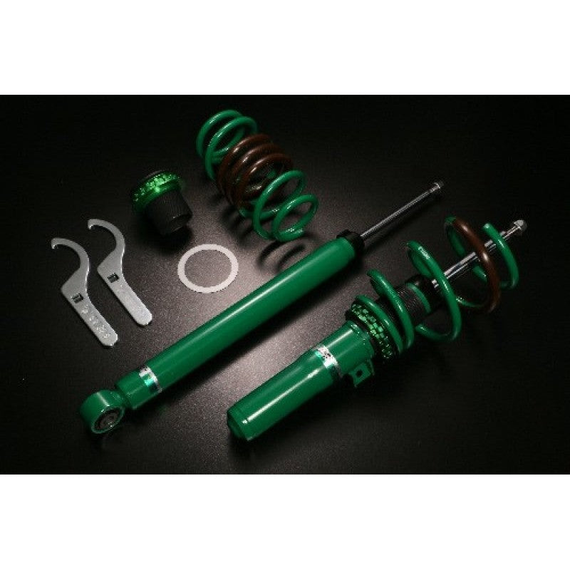 Tein Street Basis Z height-adjustable green coilovers with black springs for 2017+ Honda Civic FK7 Hatchback.