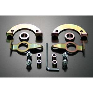 Tein EDFC Strut Kit mounting hardware and brackets for electronic damping motor installation.