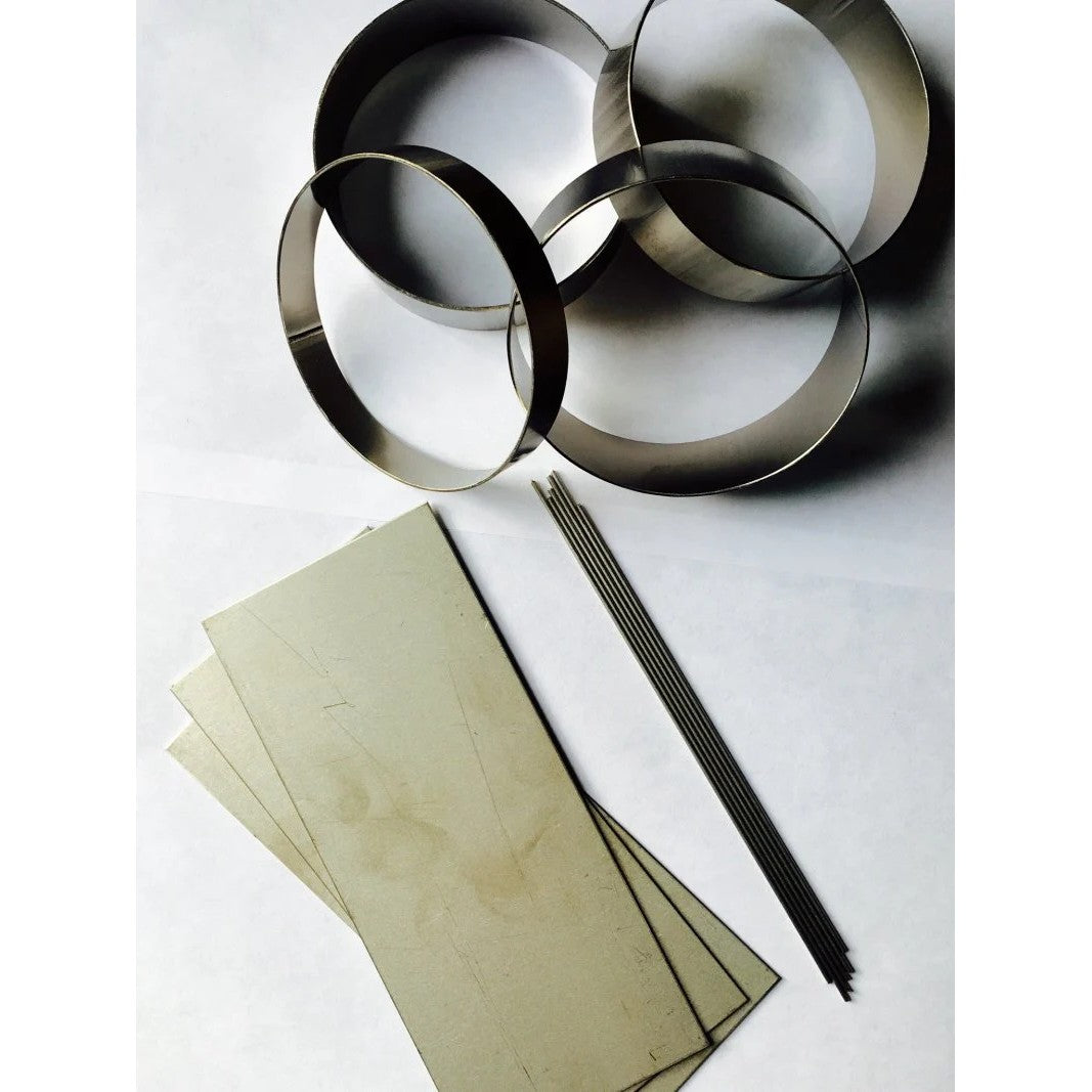 Ticon Industries CP1 titanium welding sample pack containing various tubing offcuts and pie cut scrap pieces.