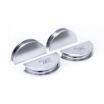 Two silver CNC machined billet aluminum valve cover cam seals for Subaru EJ engines.