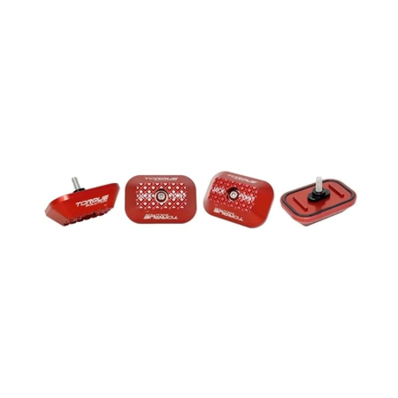 Red anodized CNC machined billet aluminum jack pad adapter for Toyota GR Supra, BMW, and Mini Cooper.