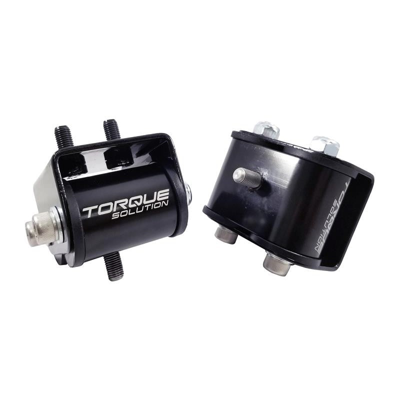 A pair of silver CNC machined billet aluminum engine mounts with black polyurethane bushings for Subaru vehicles.