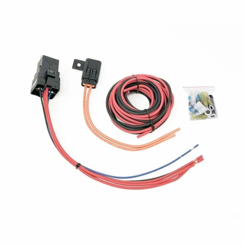 Torque Solution heavy duty fuel pump hardwire kit including weatherproof relay, fuse holder, and wiring components.