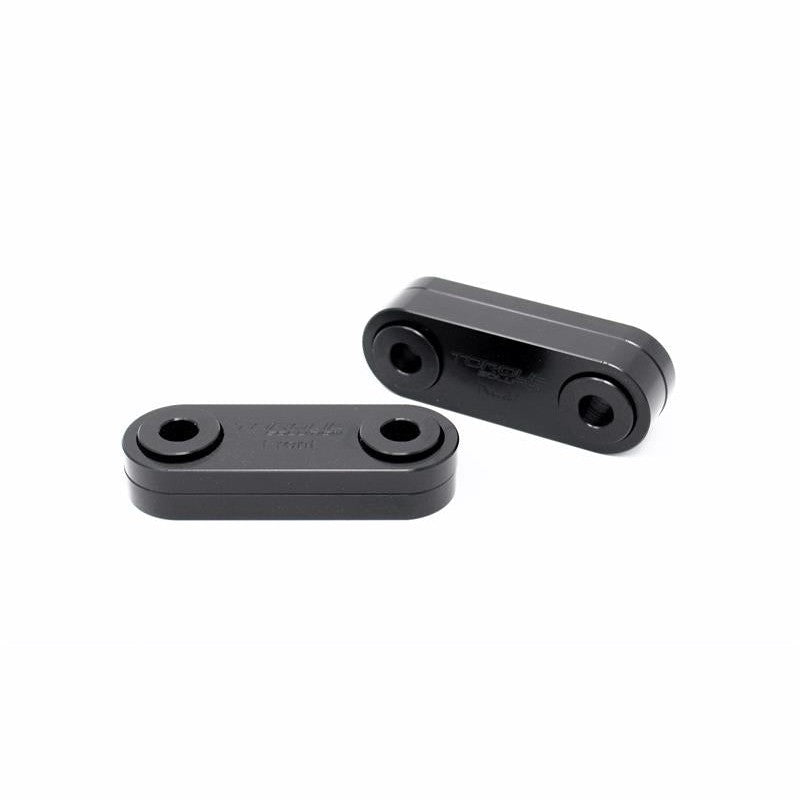 CNC-machined solid billet aluminum positive shift kit components for Subaru transmissions.