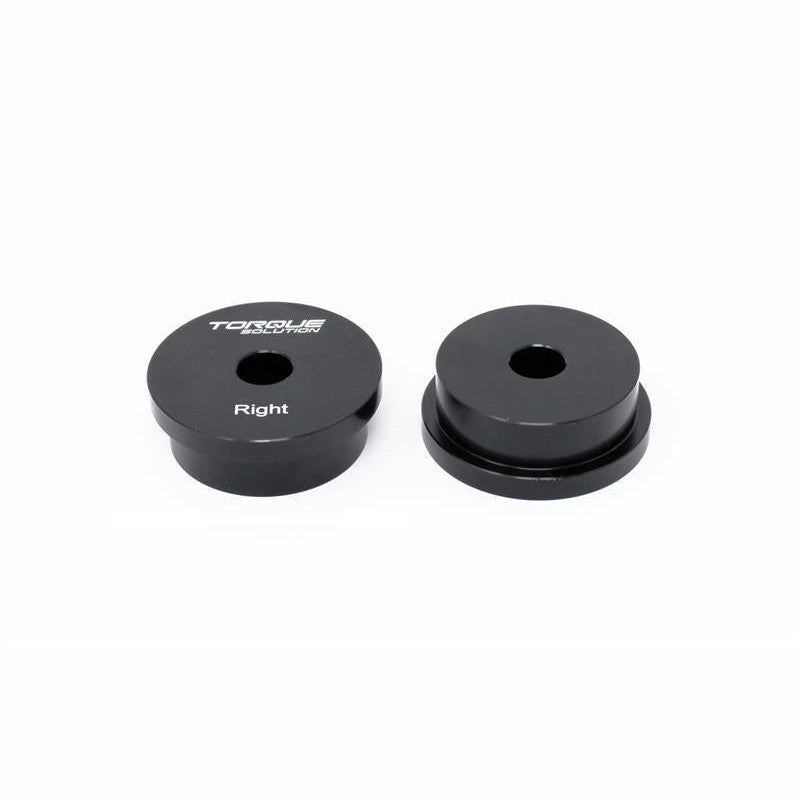CNC machined silver Torque Solution solid billet shifter bushings for Subaru 5-speed manual transmissions.