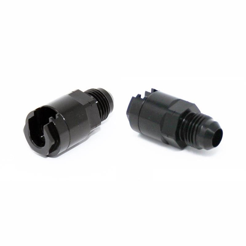 A pair of Torque Solution -6AN to -6AN hard line adapter fittings for Subaru models.