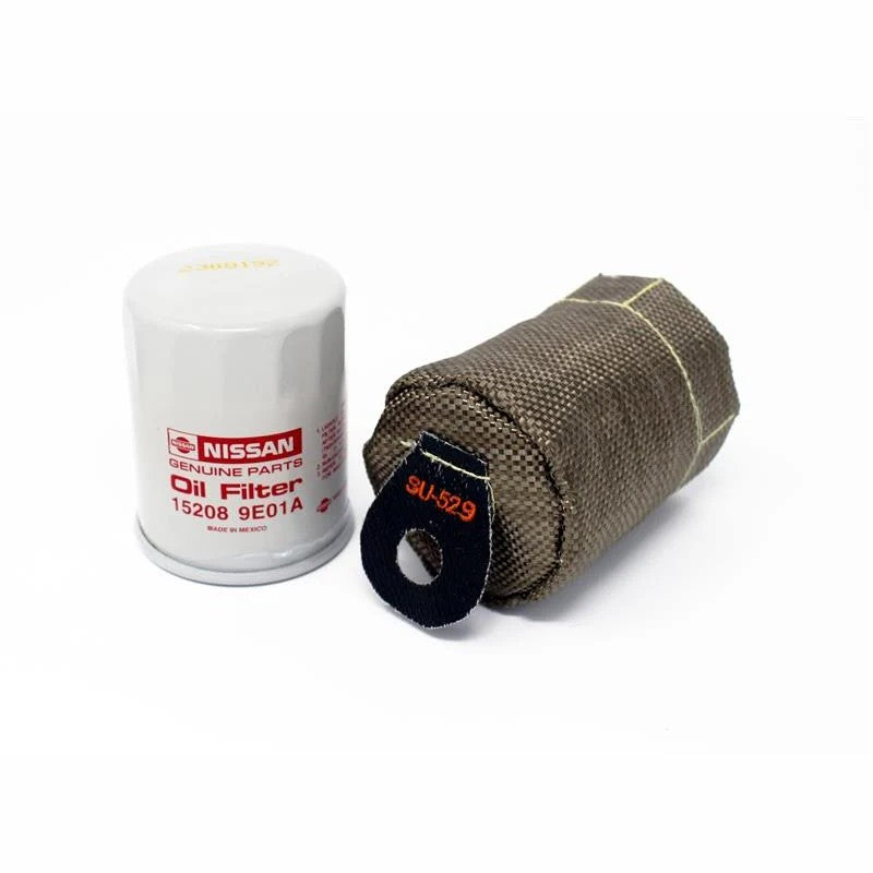 Torque Solution black thermal oil filter blanket with silver heat-reflective interior for Subaru EJ and Nissan filters.