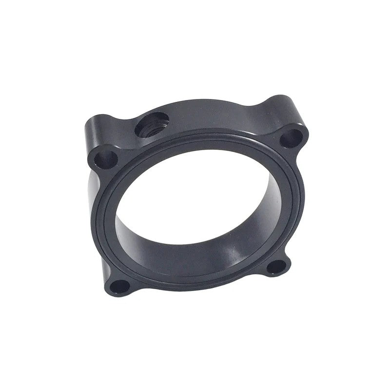Torque Solution black CNC machined throttle body spacer for Audi and Volkswagen 2.0T engines.