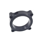 Torque Solution black CNC machined throttle body spacer for Audi and Volkswagen 2.0T engines.