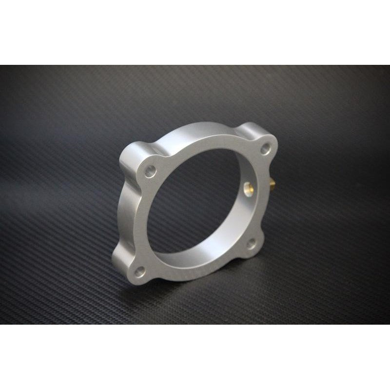 Silver Torque Solution throttle body spacer for 2013-2016 Hyundai Genesis Coupe V6-3.8L
