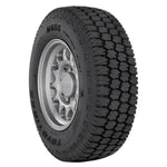 Toyo M655 mixed-service commercial tire showing heavy-duty tread blocks and 285/70R19.5 sidewall markings.