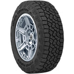 Toyo Open Country A/T III all-terrain tire showing aggressive tread blocks and sidewall lugs
