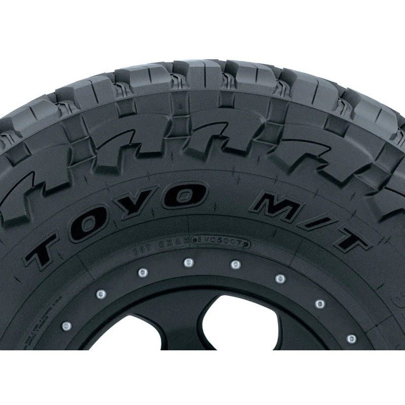 Toyo Open Country M/T off-road tire showing aggressive hook-shaped tread blocks in size 42X13.50R17.