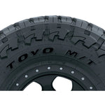 Toyo Open Country M/T off-road tire showing aggressive hook-shaped tread blocks in size 42X13.50R17.